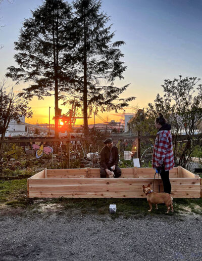 Photo of two men building community garden box, Wall Street Community Garden, Vancouver.