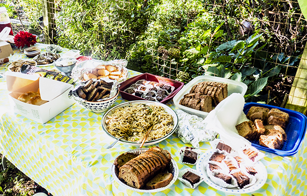 Array of food at Wall Street Community Garden potluck.