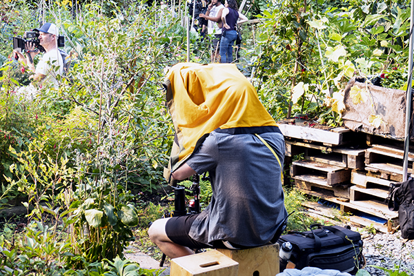 Cameraperson at Wall Street Community Garden TV pilot shoot.