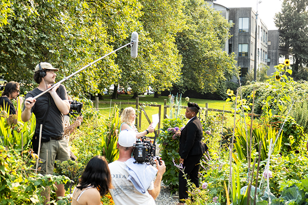 Actors at Wall Street Community Garden TV pilot shoot.